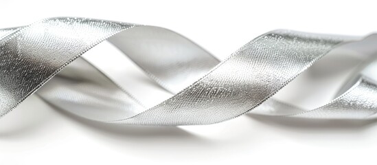 Sticker - Close up of a beautiful silver ribbon isolated on a white background ideal for featuring in a copy space image