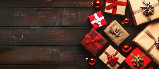 Fototapete - Christmas gift boxes displayed on a wooden background with copy space image