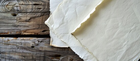 Poster - Close up of two blank paper sheets on a rustic wooden table perfect as an interior mockup template with copy space image available