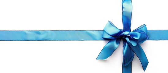Aufkleber - Blue gift bow and cross ribbon on white background with copy space image
