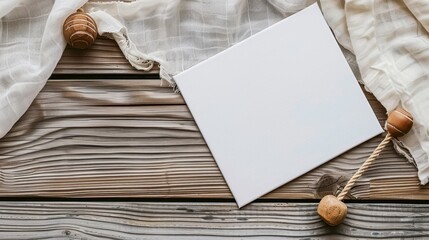 Wall Mural - A blank white card rests on a rustic wooden surface