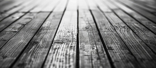 Poster - Abstract black and white wooden plank texture with a blurred focus ideal as a background for adding text or design with copy space image