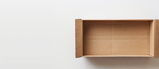 Canvas Print - Brown cardboard box displayed on white background with copy space image available