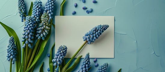 Aufkleber - Top down view of a mockup displaying a spring themed greeting card with blue muscari flowers perfect for adding text or images. Creative banner. Copyspace image