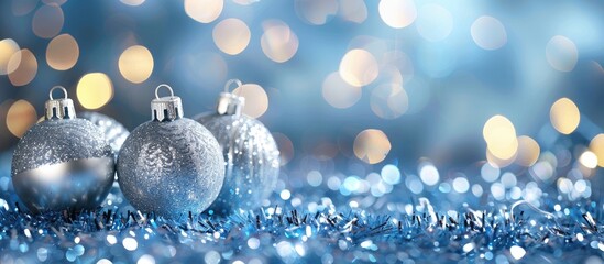 Poster - Blue and silver glittering bulbs create an abstract blurred backdrop for Christmas wallpaper decorations perfect for holiday festivals and celebrations with sparkling lights and a circle of illuminat