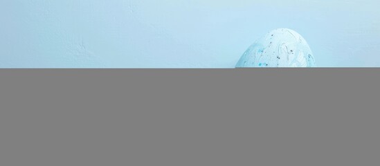 Fototapete - Top down view of a blue painted Easter egg frame providing room for text on a flat surface. Creative banner. Copyspace image
