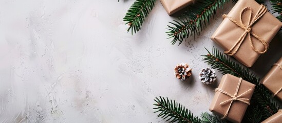 Leinwandbilder - Top view flat lay of Christmas gifts and fir branches on a background with room for text or images a copy space image