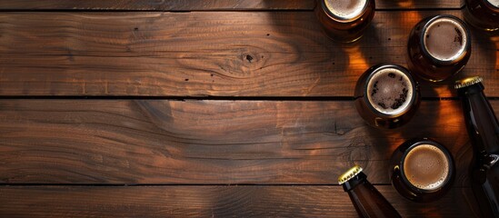 Sticker - Top view of beer bottles on a wooden table with selective focus creating a mock up with copy space for images a blank template is available