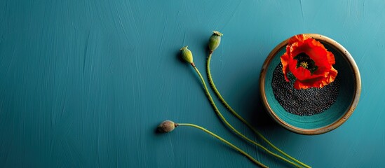 Sticker - Isolated on a blue backdrop a poppy seed container provides copy space image