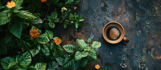 Poster - Top down view of a coffee cup placed on a tabletop in the garden with ample copy space in the image