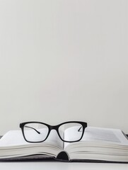 Fototapete - Open book with eyeglasses resting on its pages against a white background. Generative AI