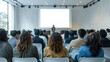© CK Studio - Diverse audience attending a seminar in a modern conference room, focused on a large projection screen.