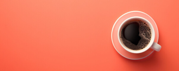 Wall Mural - Mockup. Hot black coffee on a light coral background, providing a lively and vibrant look with space for text or graphics.
