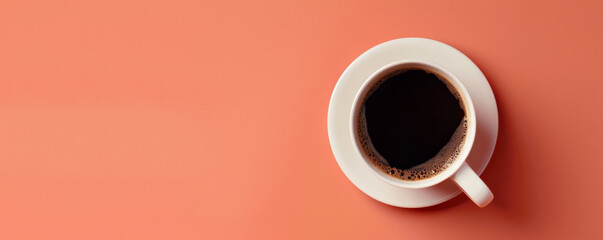 Wall Mural - Mockup. Hot black coffee on a light coral background, providing a lively and vibrant look with space for text or graphics.