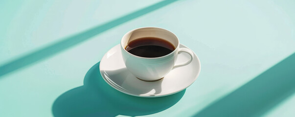 Wall Mural - Mockup. Hot coffee on a light cyan background, providing a bright and refreshing look with space for text or graphics.