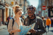 © TATIANA Z - Interracial couple navigating a city with a map, exploring together and enjoying their travel adventure