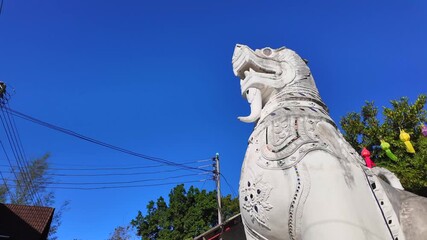 Wall Mural - Guardian dragon at the gate of a Buddhist temple.