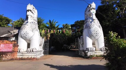Wall Mural - Guardian dragon at the gate of a Buddhist temple.