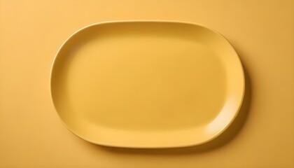 Wall Mural - A blank empty yellow plate on a yellow background with copy space for advertising your products