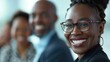 © Mechastock - African American / black business woman socializing with colleagues / Professional business people in a meeting / Concept of success and achievement