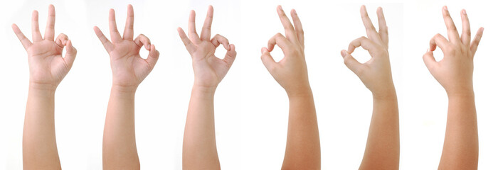 Wall Mural - Asian Boy hand gestures isolated over the white background. OK Action Pose. Front Side.