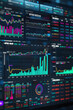 © Janjira - Dynamic financial graphs and charts displayed on a digital screen, showcasing stock market trends and real-time data analysis.