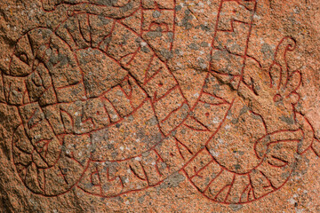 Ancient Viking runestone in the counryside of centrsl Sweden