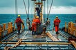 © mariodelavega - A group of technicians performing a safety check on an offshore wind turbine platform. They are using advanced diagnostic equipment and discussing their findings.