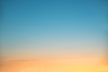 Wall Mural - colorful sunset sky, gradient from yellow and orange to blue, natural background