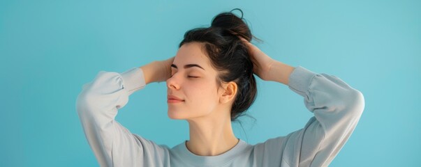 Wall Mural - Serene Woman Engaging in Self-Care Routine for Mental Health, Profile View in Pastel Grey Attire