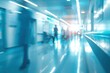 © SKIMP Art - Blurred background of a hospital corridor with medical equipment and people in motion, a light blue color palette Generative AI