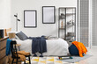 © New Africa - Teen's room interior with modern furniture and empty frames on wall