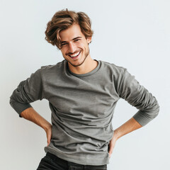 Wall Mural - young handsome man standing on white background