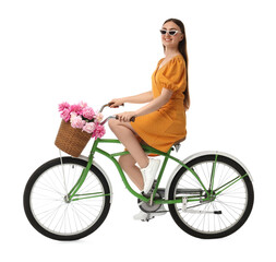 Poster - Smiling woman in sunglasses riding bicycle with basket of peony flowers on white background