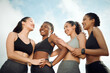 © peopleimages.com - Woman, group and fitness with runners laughing, happiness and smile outside with sky background. Friends, athlete and support or marathon training collaboration, together and confident for exercise