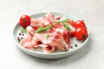 Wall Mural - Slices of raw bacon, spices and tomatoes on light grey table