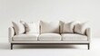© Anat art - A white, three-seater sofa with dark wood legs sits in a white room. The sofa is adorned with five white throw pillows. Generative AI