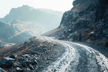 Poster - A winding dirt road climbs up the side of a mountain