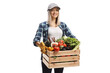 © Ljupco Smokovski - Young woman farmer carrying a crate with vegetables and smiling