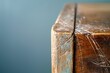 © Елена Григорова - Detailed view of a vintage wooden furniture corner with visible grain and wear.