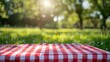 © gen_pick - Checkered Cloth on Lush Green Grass, Perfect Picnic Spot