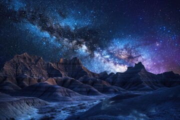 Wall Mural - A panoramic view of stars and celestial bodies against a rocky landscape at night