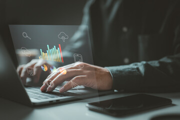 Fototapete - Person typing on a laptop with various data charts and icons. It symbolizes the use of digital technology for data analysis, communication, and cloud computing in a modern work environment.
