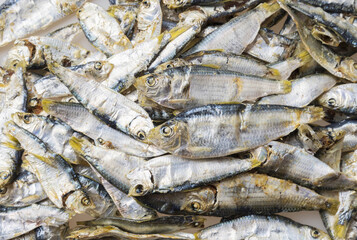 Canvas Print - Close-up of stacked dried Sardinella(large-eyed herring) with body and head, South Korea
