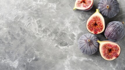 Poster - Ripe figs on light grey marble table top view space for text