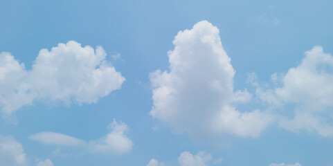 Wall Mural - Beautiful blue sky clouds background, natural texture, sunny day. Sky view. Beautiful sunny sky. Background with clouds on blue sky. Clouds on blue sky.