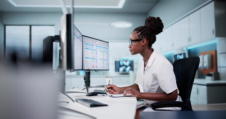 Aufkleber - Hospital Doctor Using Spreadsheet For Billing Codes On Desktop