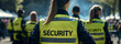 © boyhey - a group of security are overseeing a large community event