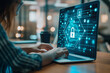 © boyhey - A businesswoman working on her laptop with digital security symbols and shield icon floating above the screen, representing data protection in the concept of cyber security