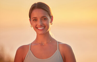 Poster - Sunset, portrait and woman with smile for fitness, workout and ready for outdoor exercise with confidence. Female person, wellness and health for girl, training and wellbeing with pride for self care